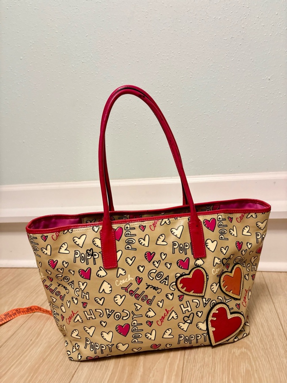 Coach Beige Canvas Tote with Red Trim and Pink Heart Accents